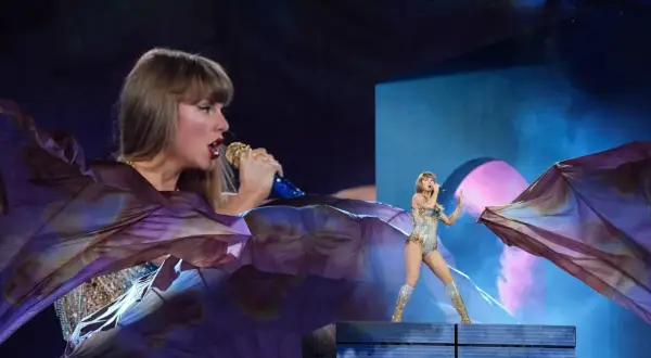 Taylor Swift na Taylor Swift The Eras Tour w błyszczącym stroju, z wielkim fioletowym materiałem unoszącym się wokół niej.
