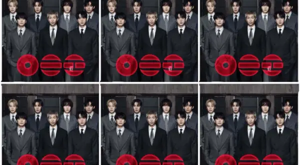 BTS w garniturach, z czerwonymi symbolami.